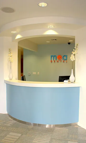 {PRACTICE_NAME} receptionist desk